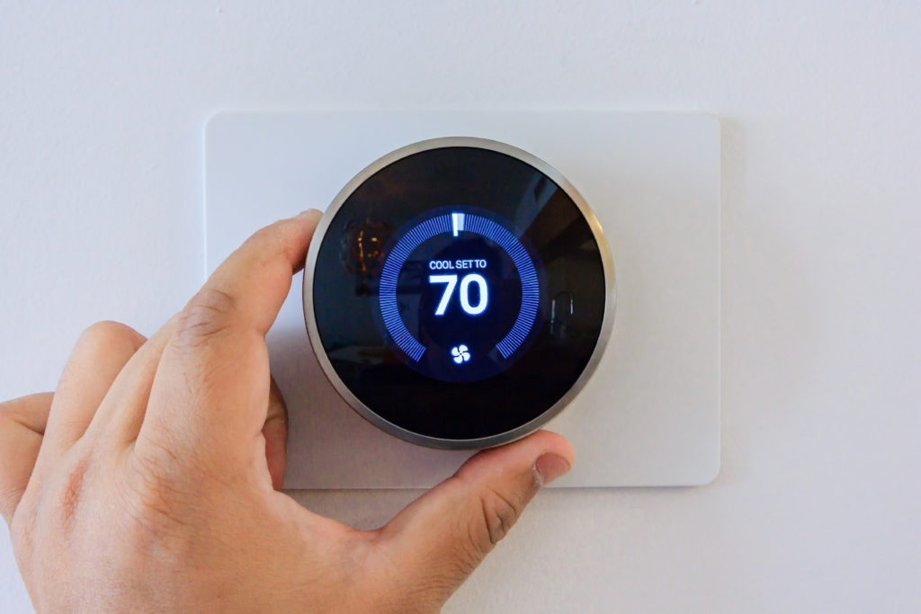 smart thermostat in a wall